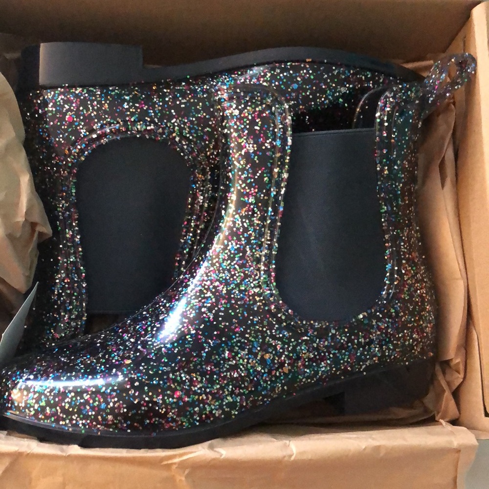 Brand new sparkly rain boots never worn.